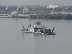Barge carrying containers